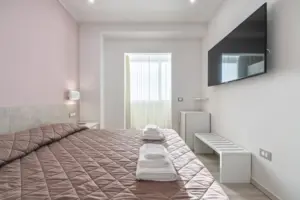 a bed with towels on it