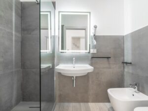 a bathroom with a mirror and sink